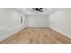 Spacious basement featuring hardwood flooring, ample lighting, and neutral-toned walls at 3351 Grand Central Dr, Snellville, GA 30078