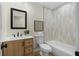 Well-lit bathroom with bathtub, modern vanity, and contemporary decor at 3351 Grand Central Dr, Snellville, GA 30078