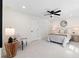 Cozy bedroom with a ceiling fan, neutral tones, and comfortable furnishings at 3351 Grand Central Dr, Snellville, GA 30078