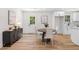 Dining area featuring a round table with seating for four and stylish decor at 3351 Grand Central Dr, Snellville, GA 30078