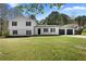 Charming two-story home with a well-maintained front yard and a two car garage at 3351 Grand Central Dr, Snellville, GA 30078