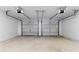 Spacious two-car garage with automatic door openers and ample room for storage at 3351 Grand Central Dr, Snellville, GA 30078