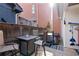 Charming back deck with a privacy fence, hot tub and ample seating, ideal for entertaining guests at 4121 N Swann St, Covington, GA 30014