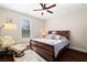 Bright bedroom has a ceiling fan and lots of natural light from the window at 4121 N Swann St, Covington, GA 30014