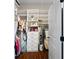 Walk-in closet with organized shelves, drawers, and rods, maximizing storage space at 4121 N Swann St, Covington, GA 30014