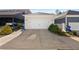 Detached two-car garage with a large driveway and mature landscaping at 4121 N Swann St, Covington, GA 30014