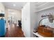 Spacious hallway with custom shelving, storage, and hardwood floors offering style and functionality at 4121 N Swann St, Covington, GA 30014