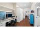 Bright home office featuring custom built-ins and granite countertops, perfect for remote work at 4121 N Swann St, Covington, GA 30014