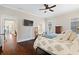 Comfortable main bedroom with hardwood floors, offering a peaceful retreat for rest and relaxation at 4121 N Swann St, Covington, GA 30014