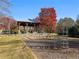 Playground with swings and climbing area, located near covered picnic area for Gathering fun at 4121 N Swann St, Covington, GA 30014