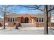 Montessori school building with brick facade and landscaped entrance, offering quality education at 4121 N Swann St, Covington, GA 30014