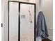 Modern shower with black trim and white tile, offering a stylish and functional space at 4121 N Swann St, Covington, GA 30014