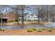 Street view of charming homes surrounded by mature trees in a well-kept neighborhood at 4121 N Swann St, Covington, GA 30014