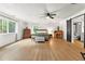 Spacious main bedroom with light floors and lots of natural light at 5785 Woodruff Rd, Chattahoochee Hills, GA 30213