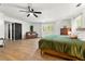 Spacious main bedroom with view of windows and sitting area at 5785 Woodruff Rd, Chattahoochee Hills, GA 30213