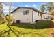 Well-maintained backyard of a charming home with a covered carport and ample green space at 1275 Calhoun Ave, Atlanta, GA 30344