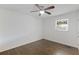 Bedroom featuring hardwood floors, bright light, and a ceiling fan at 1275 Calhoun Ave, Atlanta, GA 30344