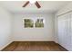 Bright bedroom with hardwood floors, double window, and closet at 1275 Calhoun Ave, Atlanta, GA 30344