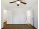 Bedroom with doors leading to other rooms and wood flooring at 1275 Calhoun Ave, Atlanta, GA 30344