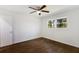 Light and bright bedroom features hardwood floors and a double window at 1275 Calhoun Ave, Atlanta, GA 30344