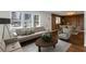 Open living room with hardwood floors and custom trim on the accent wall at 1275 Calhoun Ave, Atlanta, GA 30344