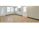 Bright living area with tiled flooring, a back door and a side entrance at 1334 Jennie Sw Ln, Lilburn, GA 30047