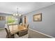 Dining room featuring neutral walls, carpet and natural light at 15 Glen Echo Dr, Covington, GA 30016