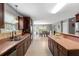 Bright kitchen featuring countertops, stainless steel appliances, and a view to the dining area at 15 Glen Echo Dr, Covington, GA 30016