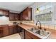 Well-equipped kitchen showcases granite counters, stainless steel appliances, and updated fixtures at 15 Glen Echo Dr, Covington, GA 30016