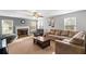 Inviting living room with a fireplace, plush seating, and a cozy atmosphere at 15 Glen Echo Dr, Covington, GA 30016