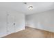 The bedroom features hardwood floors, white walls, a light fixture and a closet at 3632 Glen Mora Drive, Decatur, GA 30032