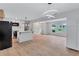 Open kitchen featuring a center island, stainless steel appliances and modern lighting at 3632 Glen Mora Drive, Decatur, GA 30032