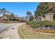 Community entrance to Keystone, featuring stone signage and landscaping at 2728 Keystone Gates Ct, Lithonia, GA 30058