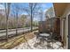 Outdoor patio featuring a table and chairs, perfect for relaxing or entertaining at 2728 Keystone Gates Ct, Lithonia, GA 30058