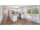 Modern kitchen featuring stainless appliances, granite countertops, and access to deck at 6510 Hazel St, Lithia Springs, GA 30122