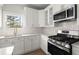Modern kitchen with updated appliances at 5010 Hyde Way, Cumming, GA 30040