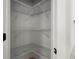 Pantry space with shelving at 5010 Hyde Way, Cumming, GA 30040