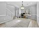 Inviting living room with large windows and neutral decor at 1151 Adah Ln, Lawrenceville, GA 30043