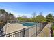 Community pool with a fenced area, perfect for relaxing and enjoying the summer at 1151 Adah Ln, Lawrenceville, GA 30043