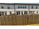 Tall wood fence ensures privacy to this backyard at 228 Auburn Valley Way, Auburn, GA 30011