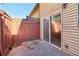 This backyard has a concrete floor, a wooden fence, and a sliding glass door at 386 Northdale Ct, Lawrenceville, GA 30046