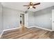 Bright bedroom with neutral walls and modern ceiling fan at 386 Northdale Ct, Lawrenceville, GA 30046