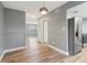 Open floorplan featuring wood floors and view to the kitchen and living area at 386 Northdale Ct, Lawrenceville, GA 30046