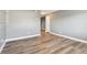 A bright living room with wood floors and a hallway at 386 Northdale Ct, Lawrenceville, GA 30046