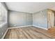 A bright living room with wood floors, large window and fresh paint at 386 Northdale Ct, Lawrenceville, GA 30046