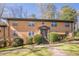 Charming brick multifamily home featuring well-maintained landscaping and a welcoming entrance at 1010 Scott Blvd # D8, Decatur, GA 30030