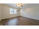 Cozy living room with hardwood floors, a window, and neutral decor at 1010 Scott Blvd # D8, Decatur, GA 30030