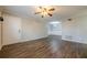 Open living space with hardwood floors, ceiling fan, and ample natural light at 1010 Scott Blvd # D8, Decatur, GA 30030