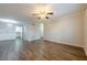 Bright and airy living room featuring new floors and a view into the dining area at 1010 Scott Blvd # D8, Decatur, GA 30030