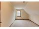 Upstairs bedroom with a vaulted ceiling and window at 1924 Sidneys Cv, Lawrenceville, GA 30043